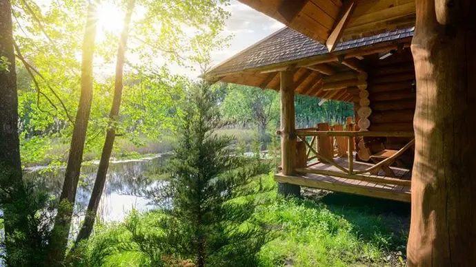 Log cabin overlooking a lake