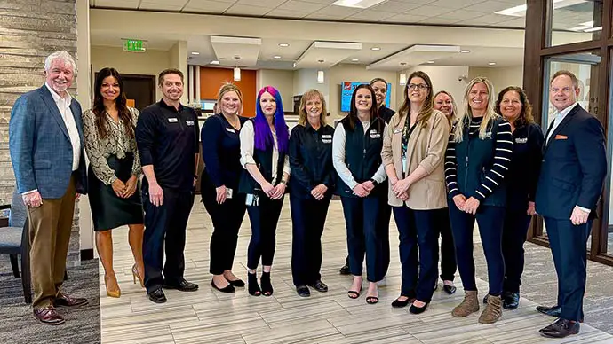 Blaze leaders and Princeton branch staff pose for a photo at Grand Opening